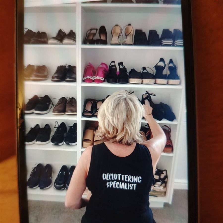 A cupboard Robyn has organised, every pair of shoes given its own place